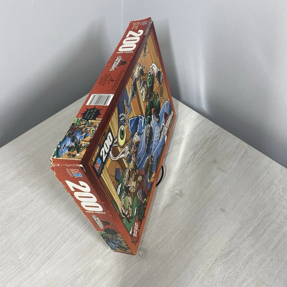 Lot of Two Vintage 1998 Milton Bradley Small Soldiers Glow Dark 200pc Puzzles